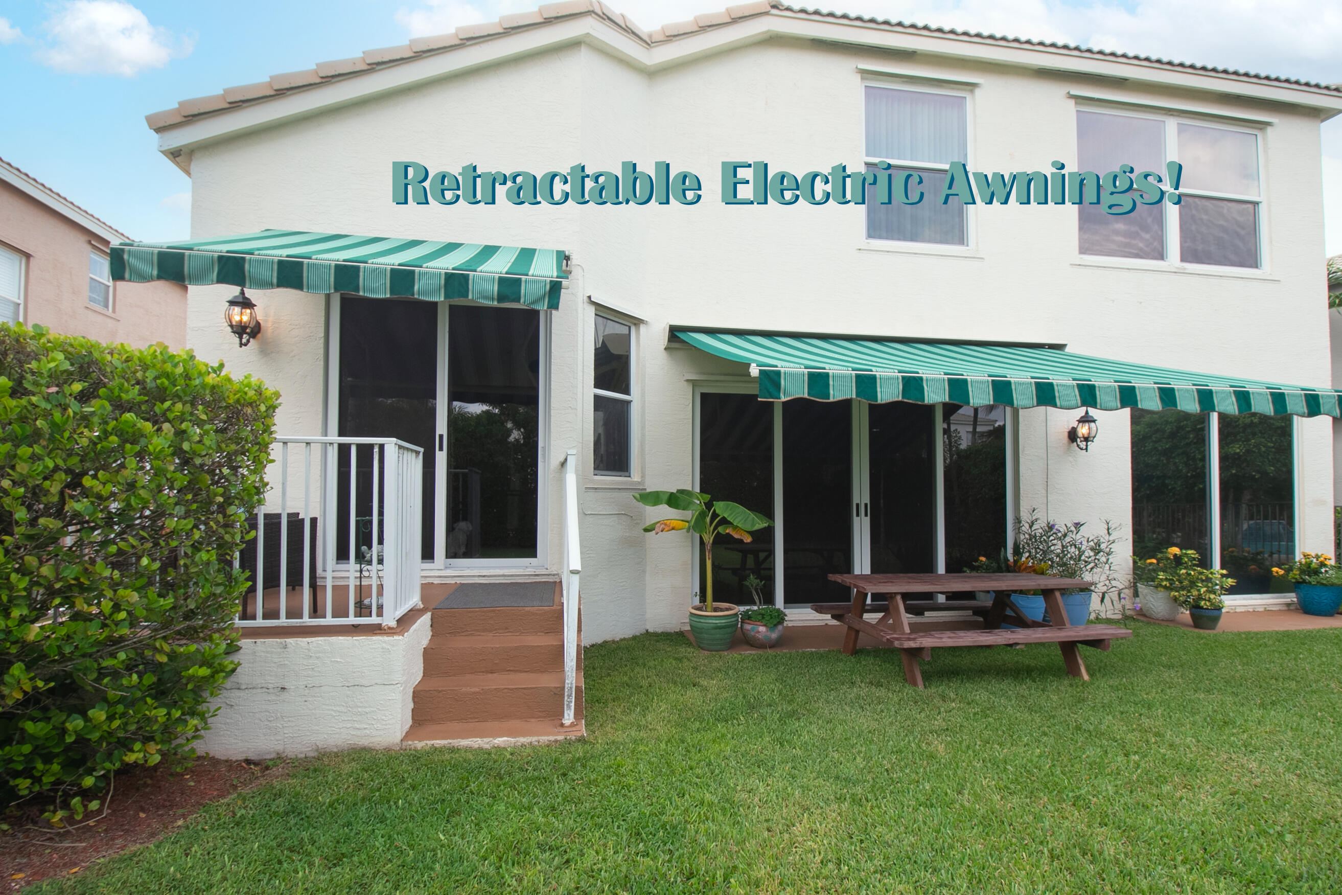2080 Reston Circle Royal Palm Beach, FL 33411 - Photo 5 of 31 Remote controlled awnings