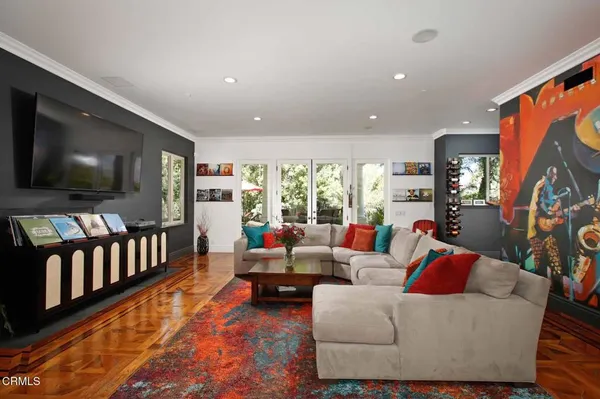 a view of a balcony dining table and chairs