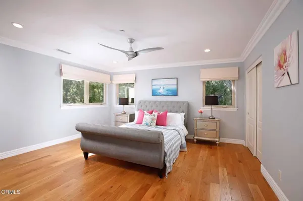 a bathroom with a tub and shower
