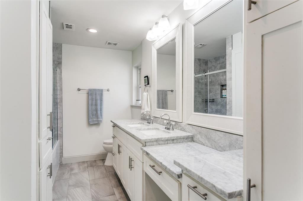 2922 Ridgewood Drive Grapevine, TX 76051 - Photo 17 of 25 a bathroom with a granite countertop sink mirror and double