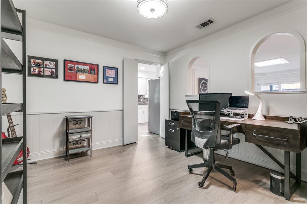 2922 Ridgewood Drive Grapevine, TX 76051 - Photo 9 of 25 a view of a workspace with furniture and a window