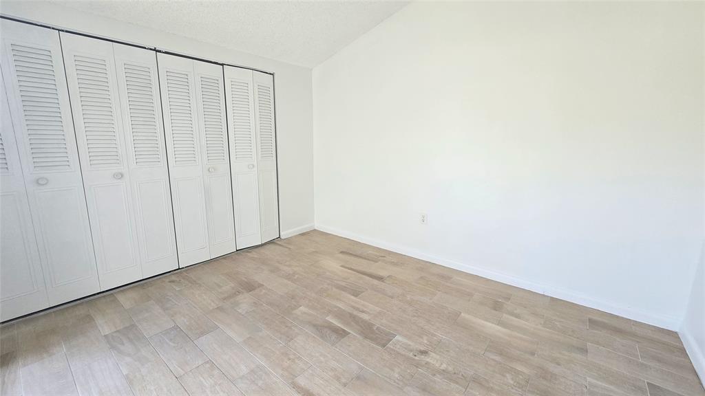 8401 West Sample Road, Unit 48 Coral Springs, FL 33065 - Photo 25 of 26 a view of an empty room