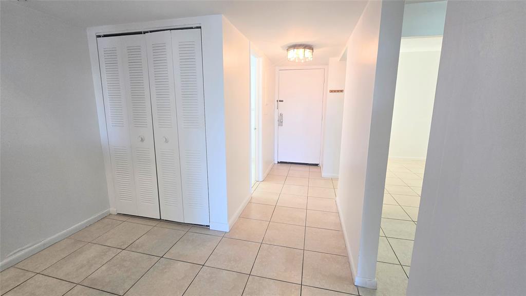 8401 West Sample Road, Unit 48 Coral Springs, FL 33065 - Photo 4 of 26 a view of a hallway