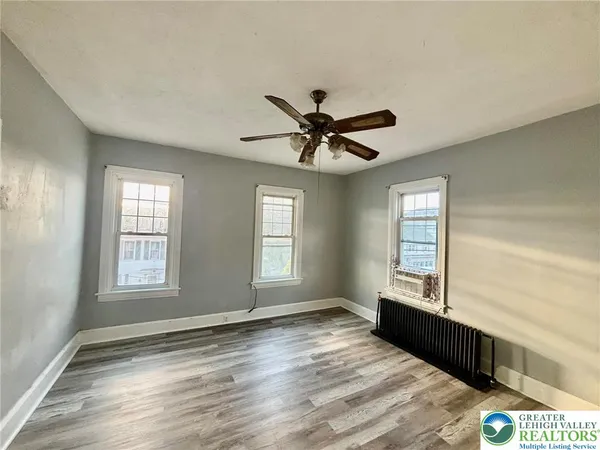 a view of an empty room and window