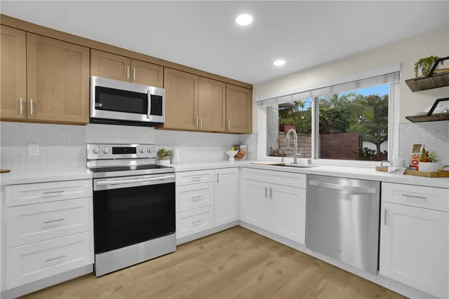 a bedroom with a large bed and a couch