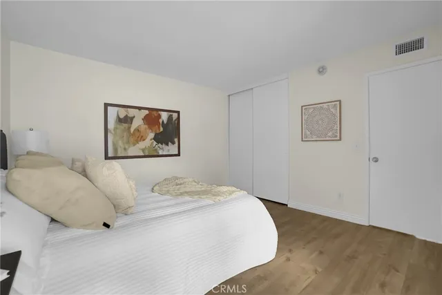 a bathroom with a shower a bathtub and a toilet