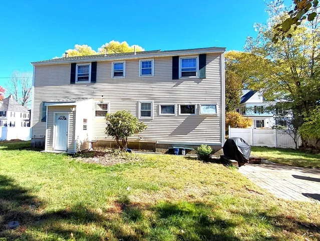 a front view of house with yard