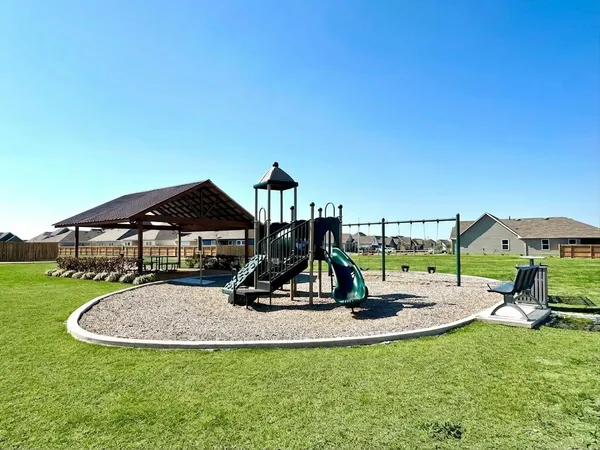 a view of a park with slide