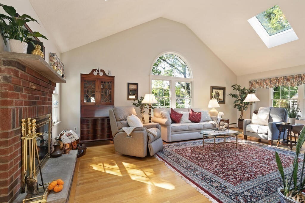 6 Wickham Road Winchester, MA 01890 - Photo 14 of 37 a living room with furniture and a large window