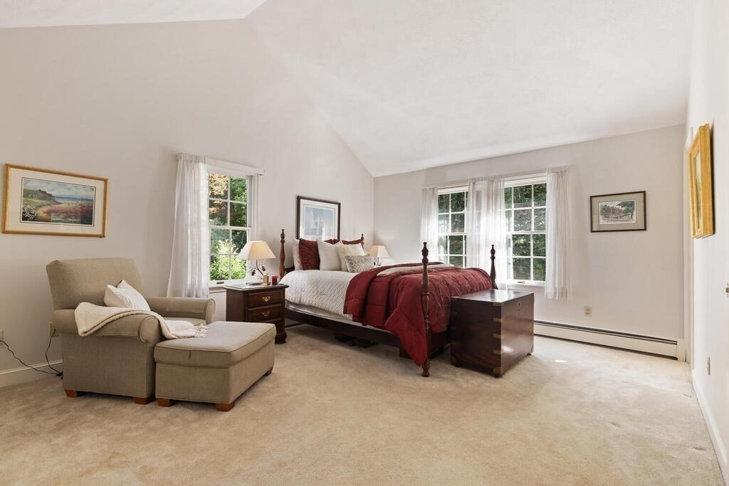 6 Wickham Road Winchester, MA 01890 - Photo 20 of 37 a spacious bedroom with a bed and a couch