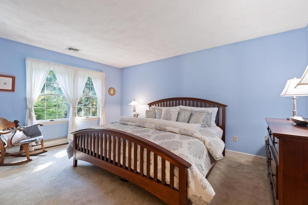 6 Wickham Road Winchester, MA 01890 - Photo 23 of 37 a bedroom with a bed and a window