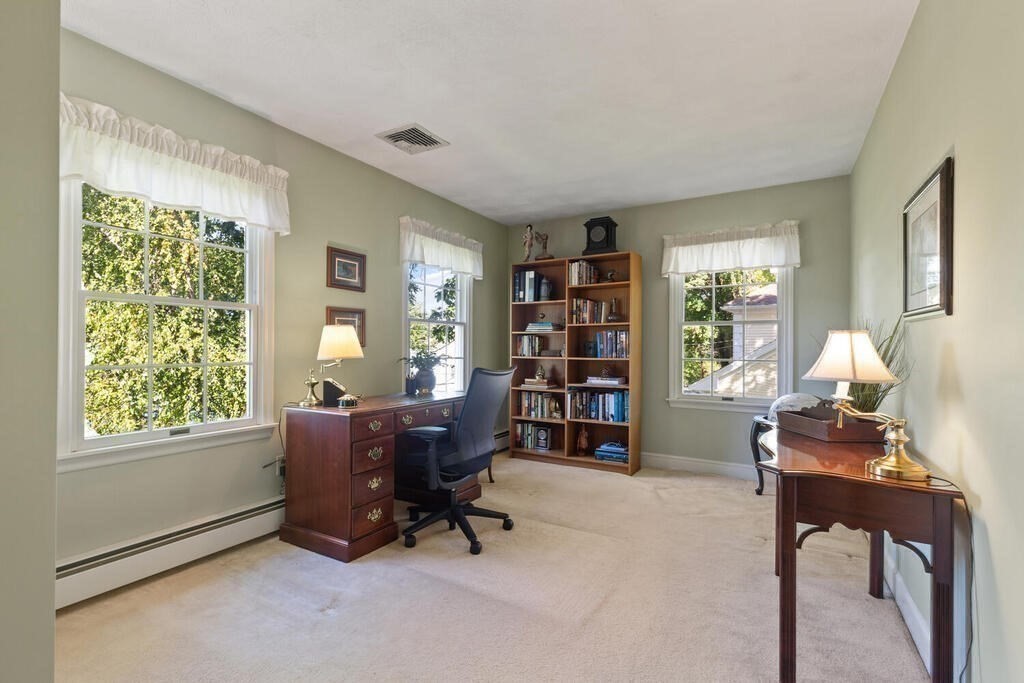 6 Wickham Road Winchester, MA 01890 - Photo 24 of 37 a living room with furniture and a window