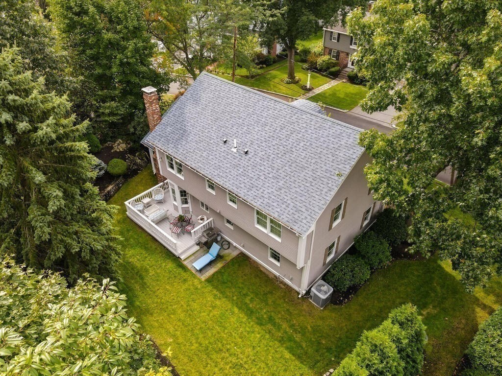 6 Wickham Road Winchester, MA 01890 - Photo 4 of 37 an aerial view of a house with a yard