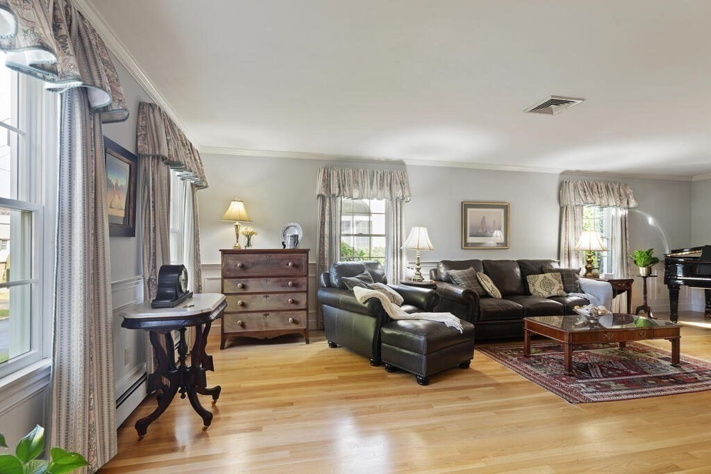 6 Wickham Road Winchester, MA 01890 - Photo 8 of 37 a living room with furniture and a fireplace