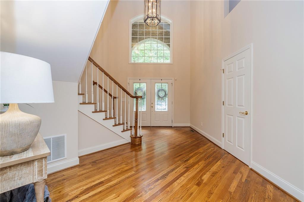 394 South Alexander Creek Road Newnan, GA 30263 - Photo 13 of 76 a view of entryway and hall with wooden floor