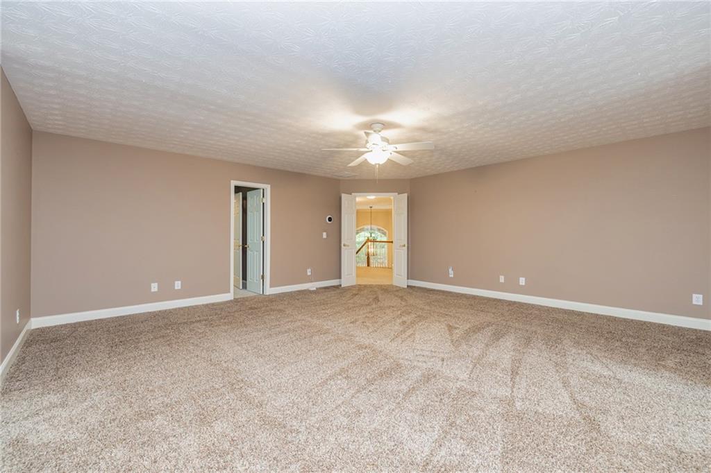 394 South Alexander Creek Road Newnan, GA 30263 - Photo 43 of 76 a view of an empty room with a window