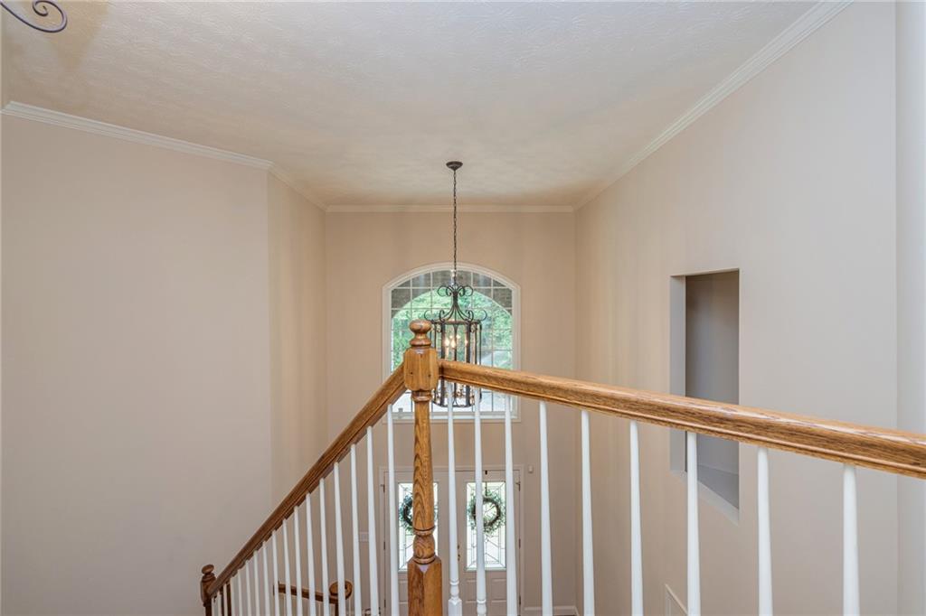 394 South Alexander Creek Road Newnan, GA 30263 - Photo 48 of 76 a view of a hallway with window