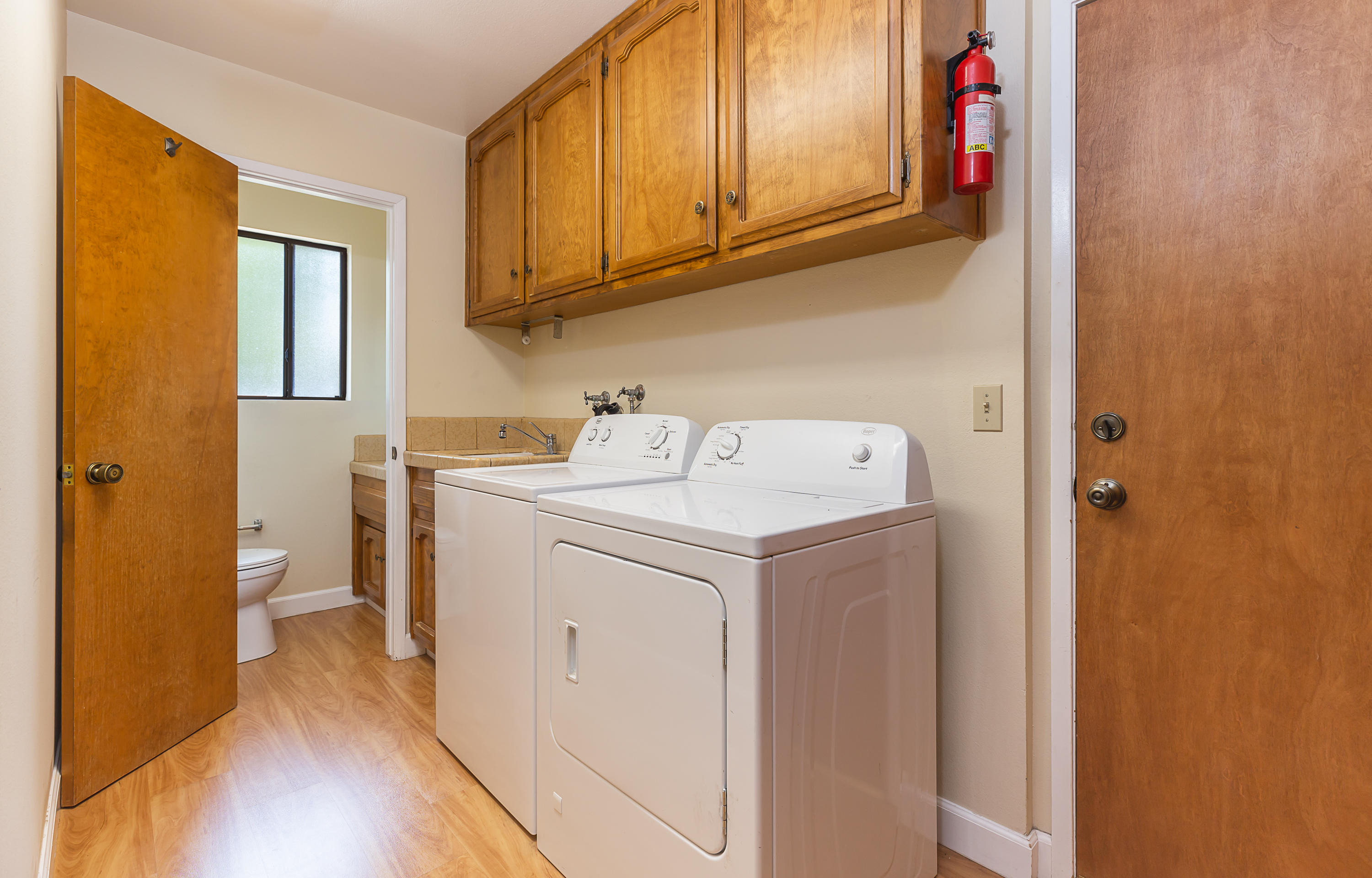 1837 Viborg Road Solvang, CA 93463 - Photo 16 of 20 a utility room with dryer and washer