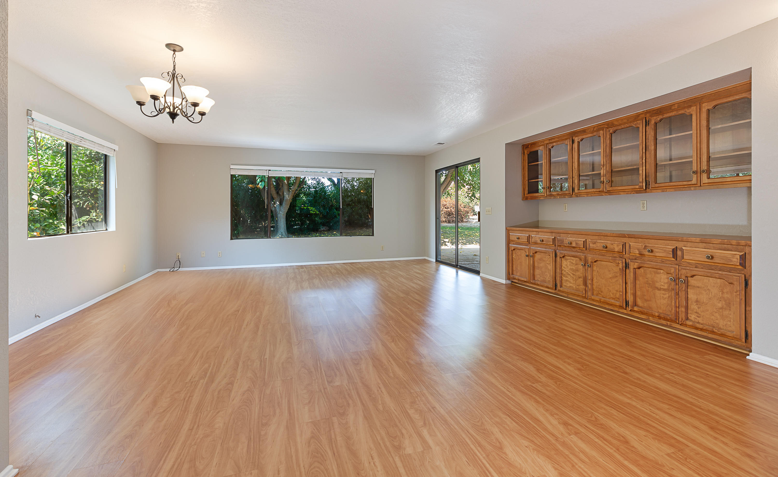 1837 Viborg Road Solvang, CA 93463 - Photo 5 of 20 a view of an empty room with wooden floor and a window