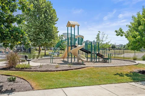 a view of a park with swings