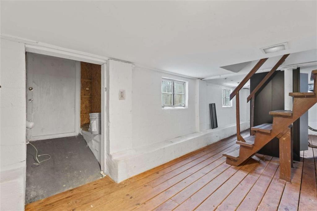 1621 North Columbia Place Decatur, GA 30032 - Photo 15 of 38 a view of a livingroom with wooden floor and a window