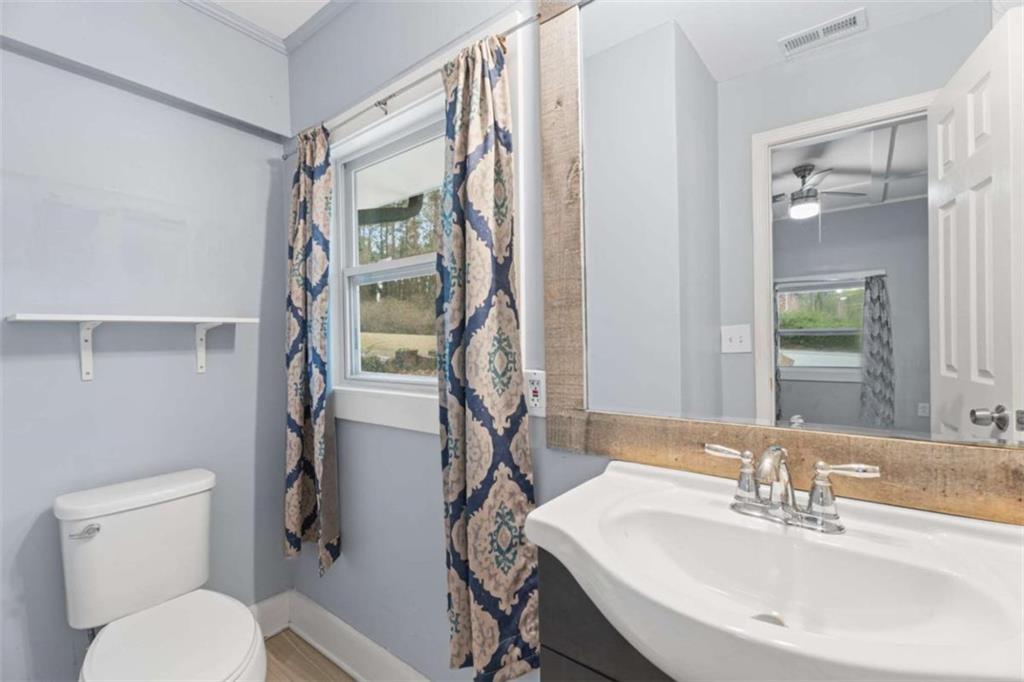 1621 North Columbia Place Decatur, GA 30032 - Photo 17 of 38 a bathroom with a sink toilet and shower