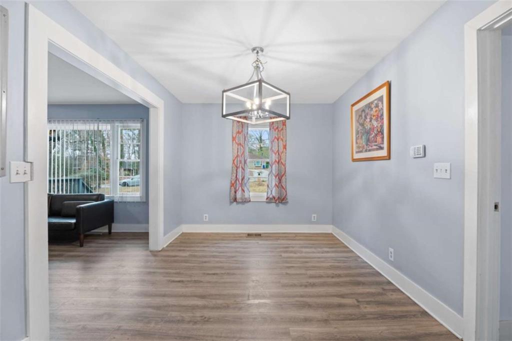 1621 North Columbia Place Decatur, GA 30032 - Photo 19 of 38 a view of an entryway with wooden floor and windows