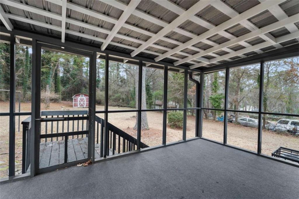 1621 North Columbia Place Decatur, GA 30032 - Photo 27 of 38 a view of an empty room with wooden floor