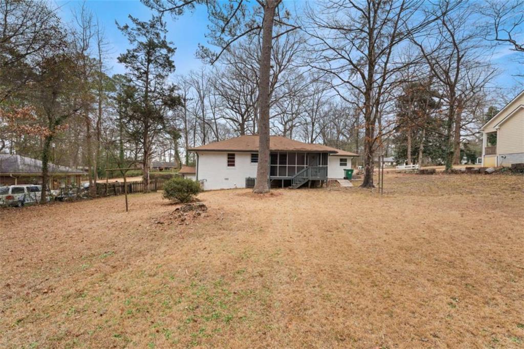 1621 North Columbia Place Decatur, GA 30032 - Photo 32 of 38 a view of house with a yard covered in snow