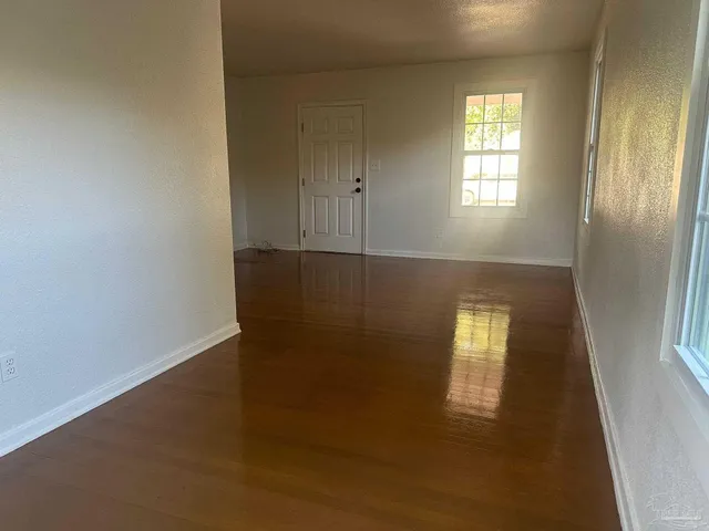 an empty room with windows