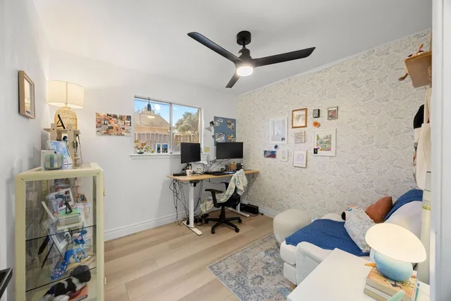 a workspace with furniture and window