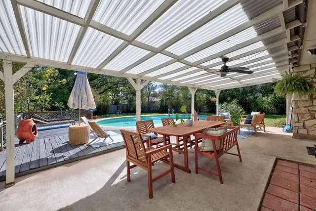 a patio with patio lots of furniture and garden view
