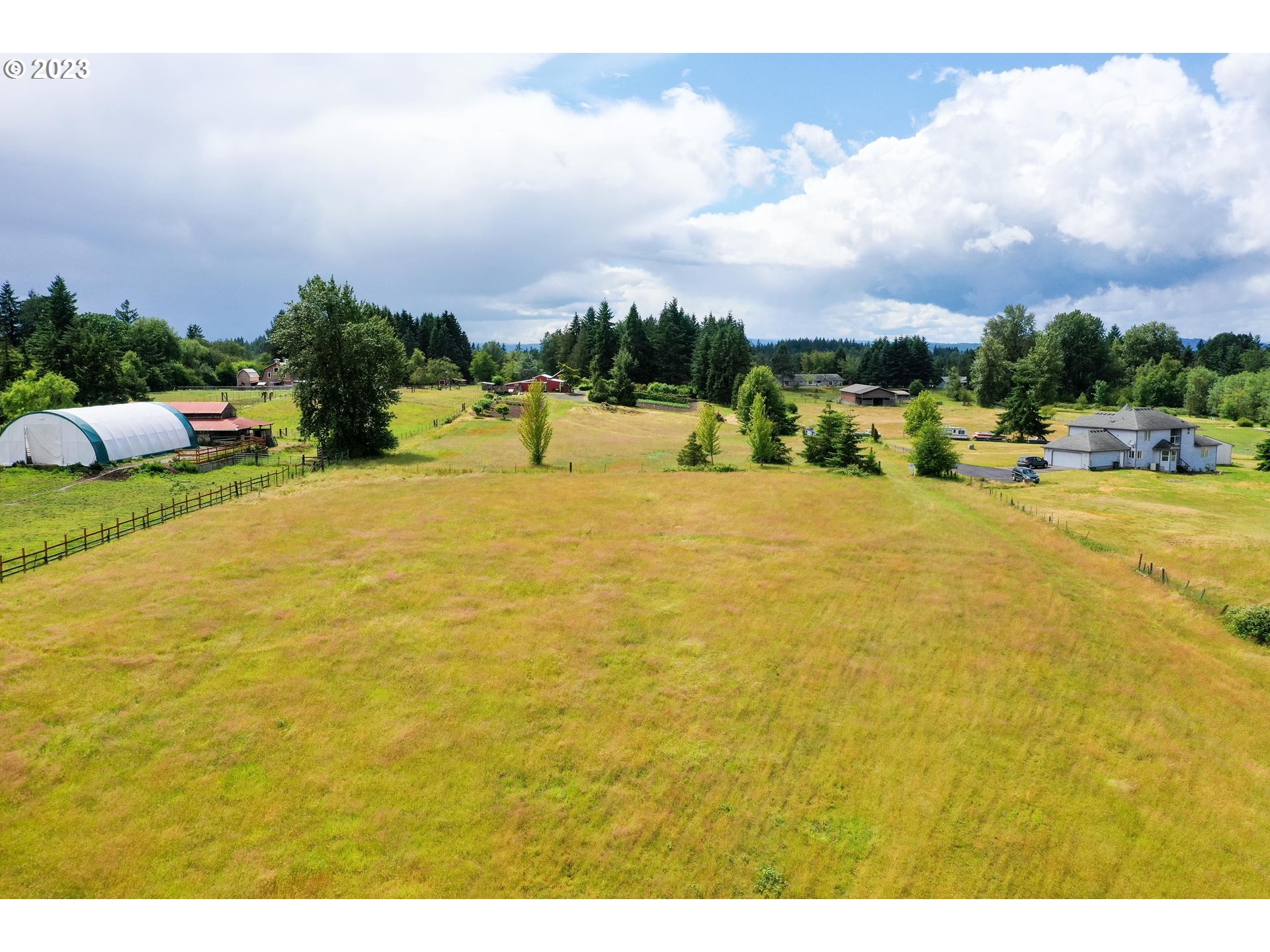 32907 Northwest 41st Avenue Ridgefield, WA 98642 - Photo 5 of 5 a view of a swimming pool with an ocean view