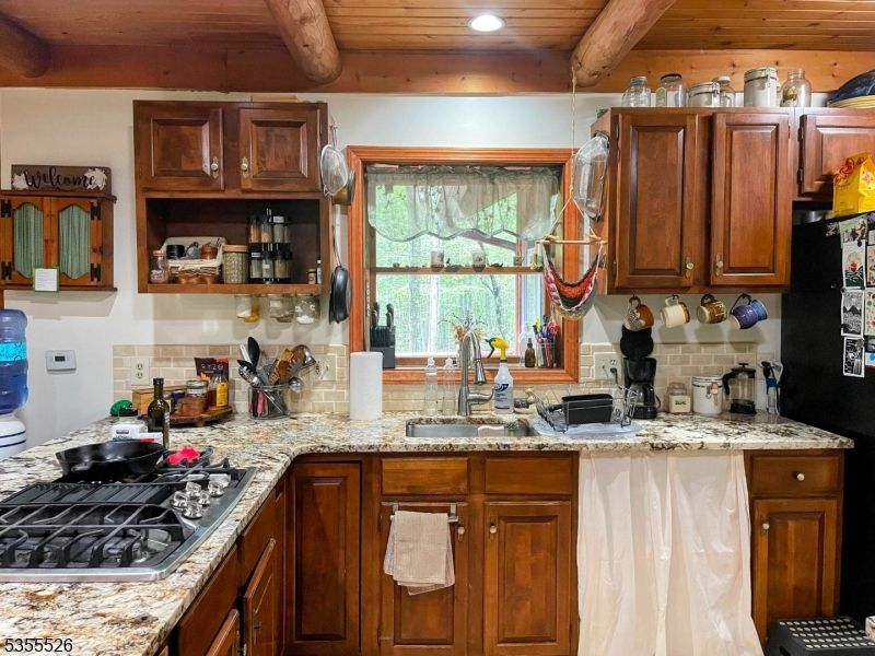101 Flatbrook Road Branchville, NJ 07827 - Photo 10 of 28 a kitchen with stainless steel appliances granite countertop a sink stove and cabinets