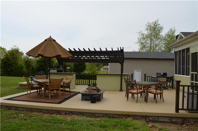 3225 Ridge Road Cedar Hill, TN 37032 - Photo 18 of 20 Entertain Guests On This Beautiful Patio with Firepit, Grill, Pergola and Plenty of Seating