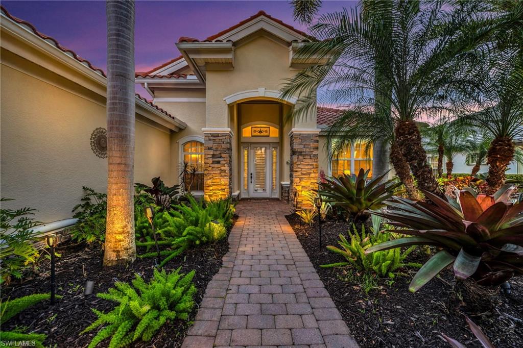 12080 Wicklow Lane Naples, FL 34120 - Photo 2 of 36 Property entrance night shot
