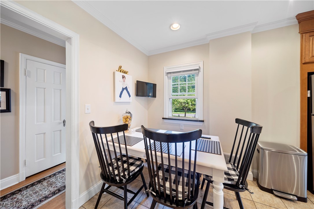 62 Fairfield Road Painesville, OH 44077 - Photo 16 of 34 Dining space featuring crown molding