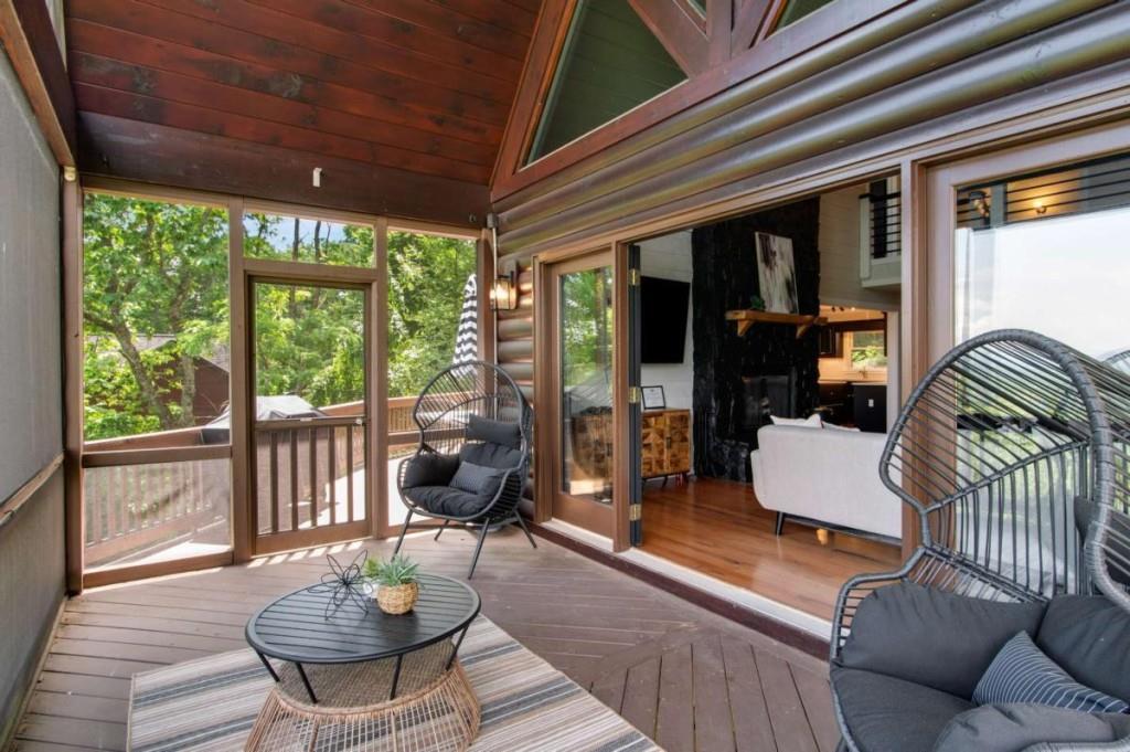 231 Sunrock Mountain Trail Blue Ridge, GA 30513 - Photo 23 of 61 a outdoor living space with furniture and a garden