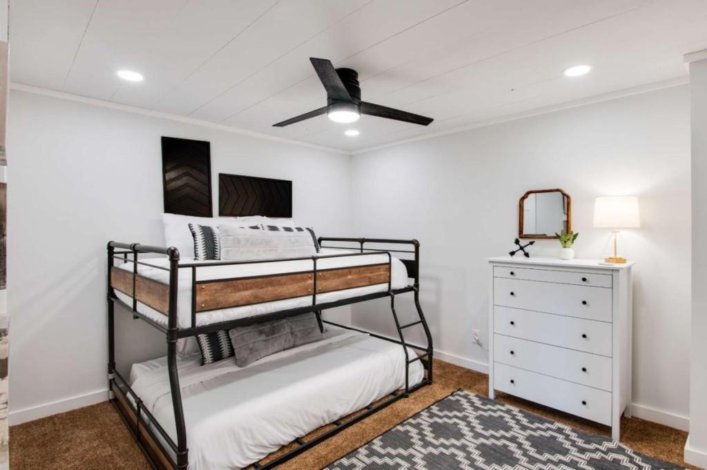 231 Sunrock Mountain Trail Blue Ridge, GA 30513 - Photo 44 of 61 a living room with furniture and a flat screen tv