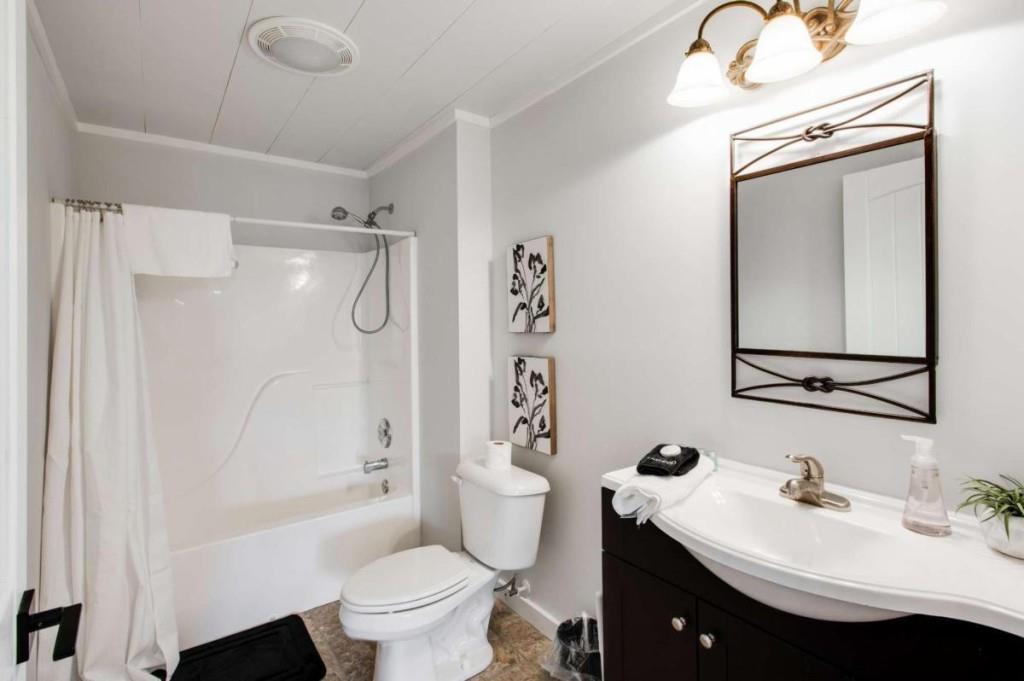 231 Sunrock Mountain Trail Blue Ridge, GA 30513 - Photo 52 of 61 a bathroom with a sink toilet tub and shower