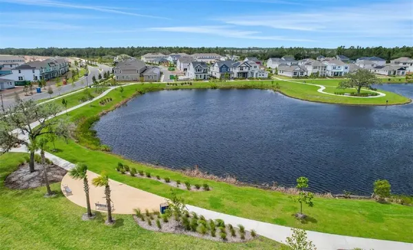 an aerial view of a house with a garden