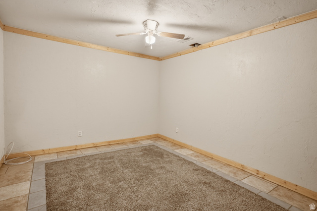 337 North Main Street Central Valley, UT 84754 - Photo 30 of 40 Spare room featuring ceiling fan and a textured ceiling