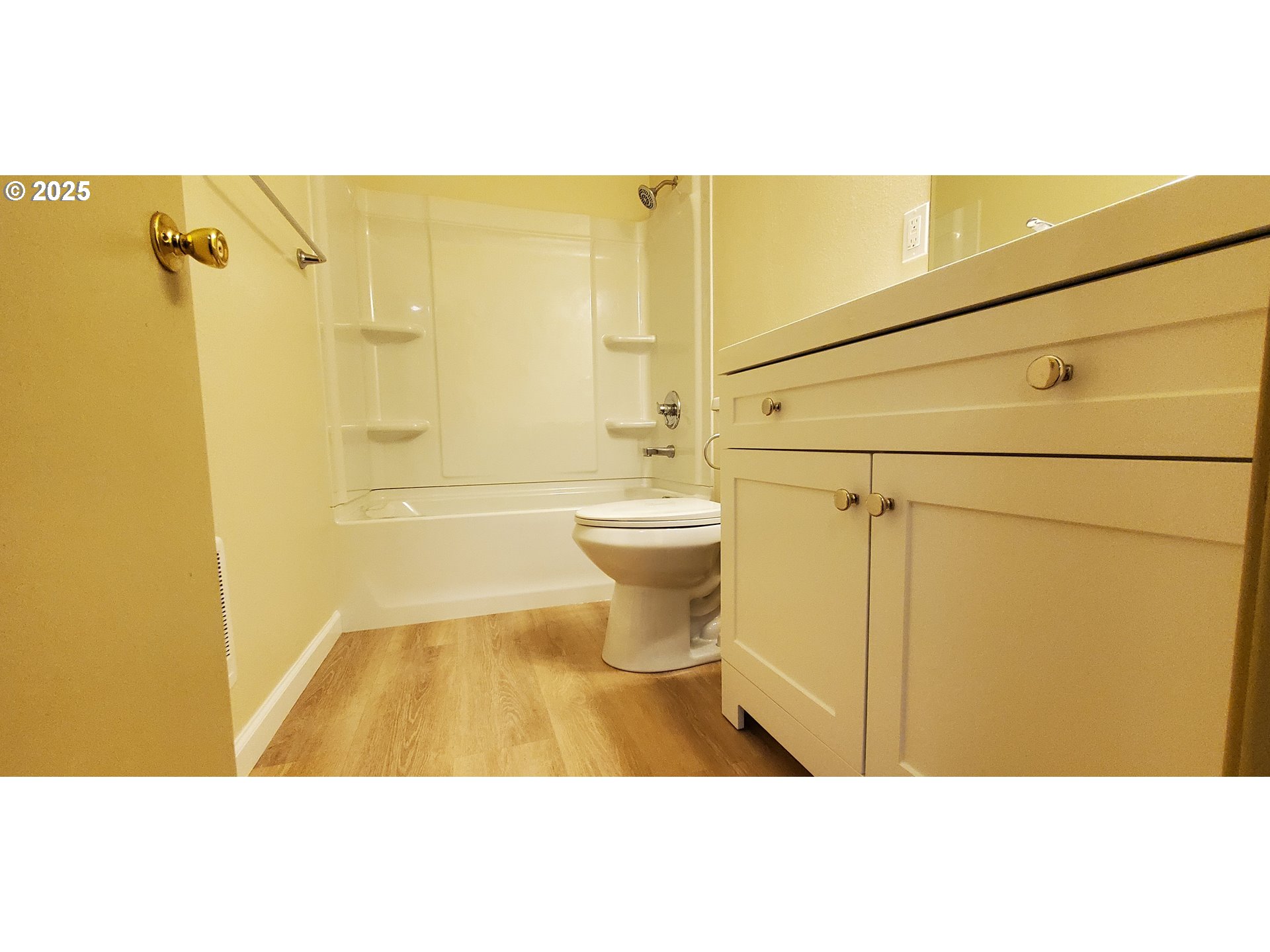 101 Ash Street Ridgefield, WA 98642 - Photo 13 of 15 a bathroom with a toilet and a shower