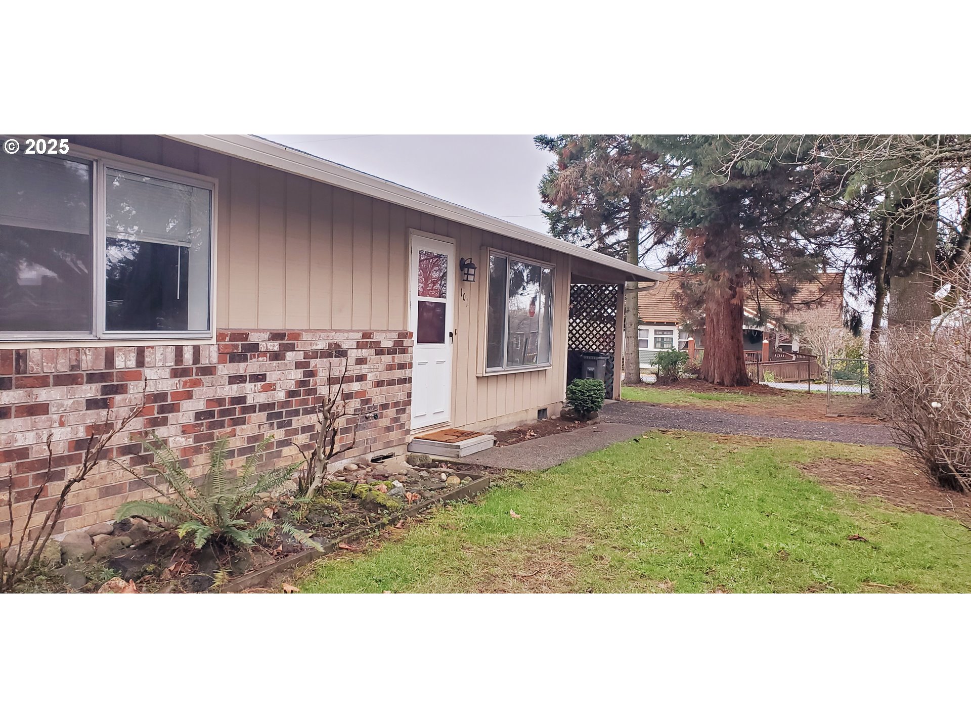101 Ash Street Ridgefield, WA 98642 - Photo 2 of 15 a view of house with yard