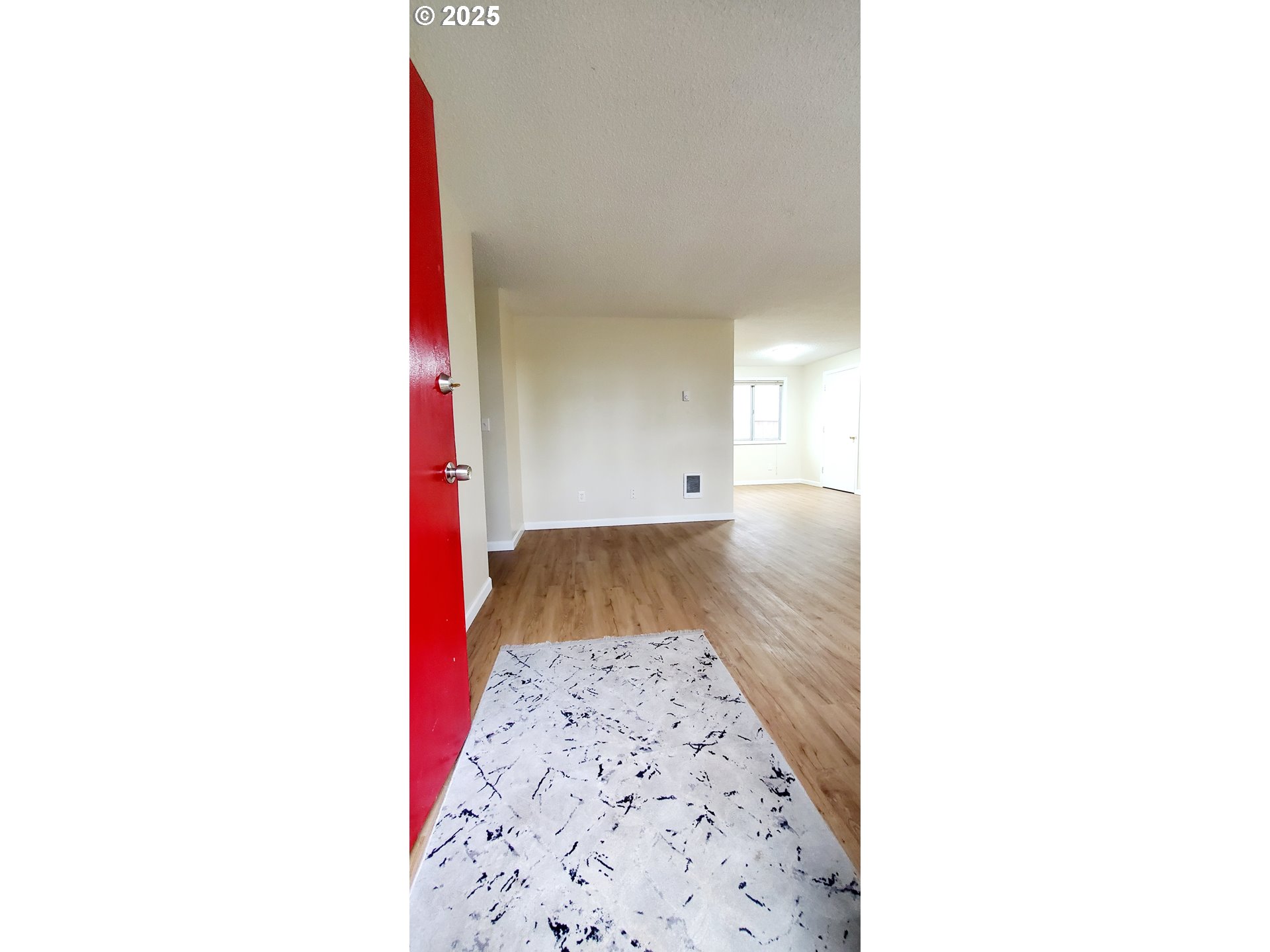 101 Ash Street Ridgefield, WA 98642 - Photo 3 of 15 a picture of a person on a wall