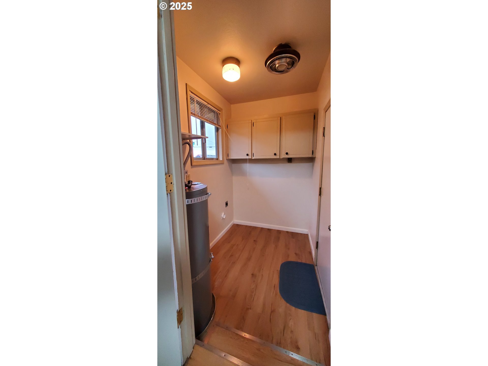 101 Ash Street Ridgefield, WA 98642 - Photo 6 of 15 a view of walk in closet with clothes and shoes