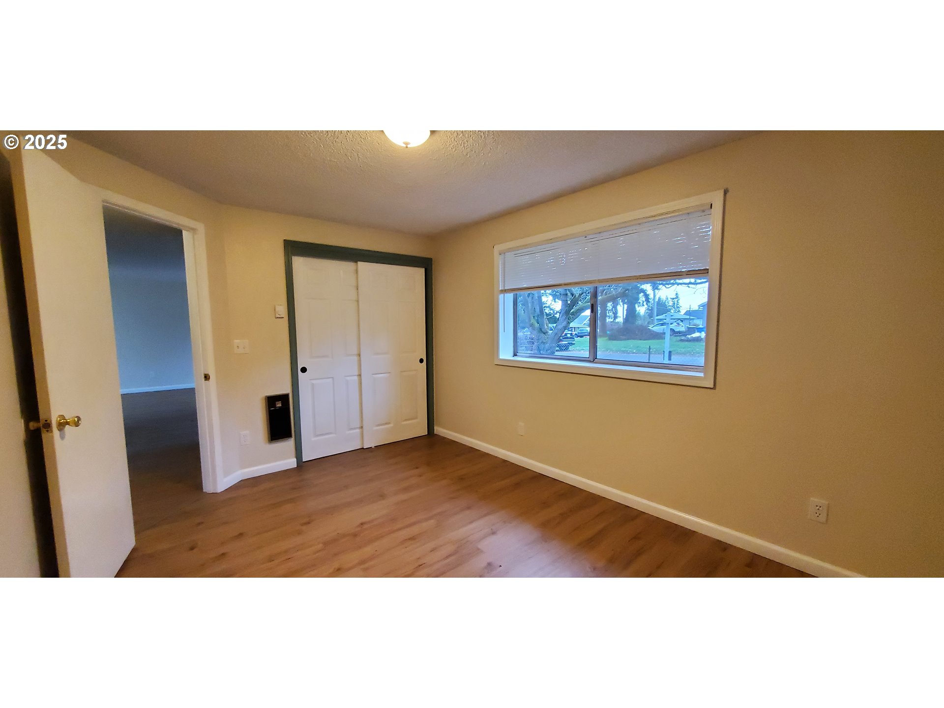 101 Ash Street Ridgefield, WA 98642 - Photo 8 of 15 a view of an empty room with a window