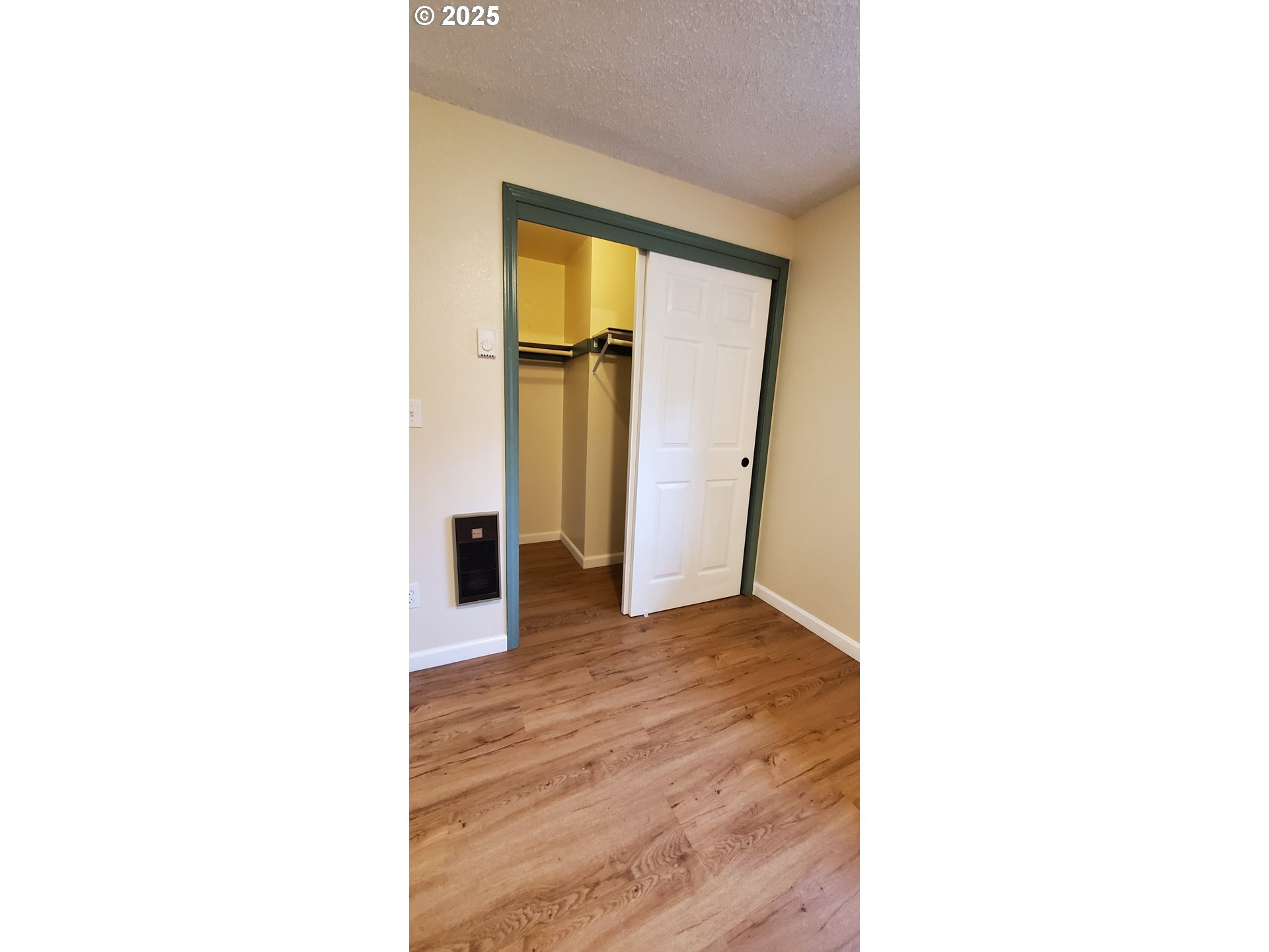 101 Ash Street Ridgefield, WA 98642 - Photo 9 of 15 a view of an empty room with a window
