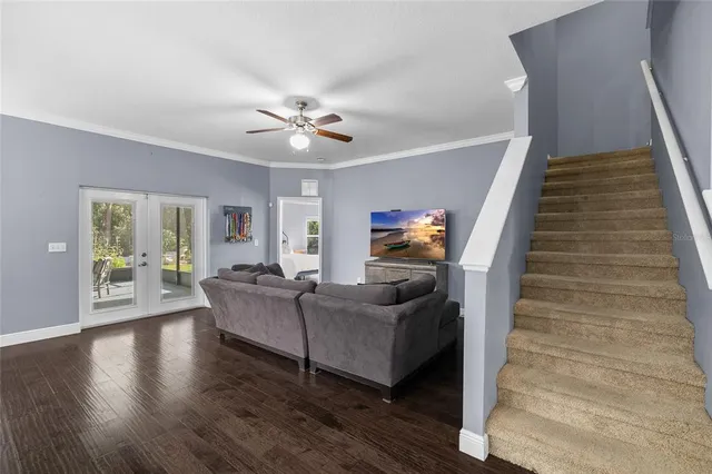 a kitchen with stainless steel appliances granite countertop a refrigerator sink and stove