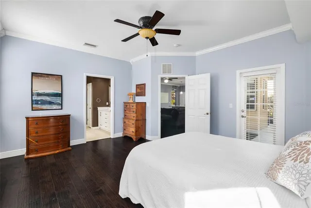 a view of a livingroom with workspace and a window